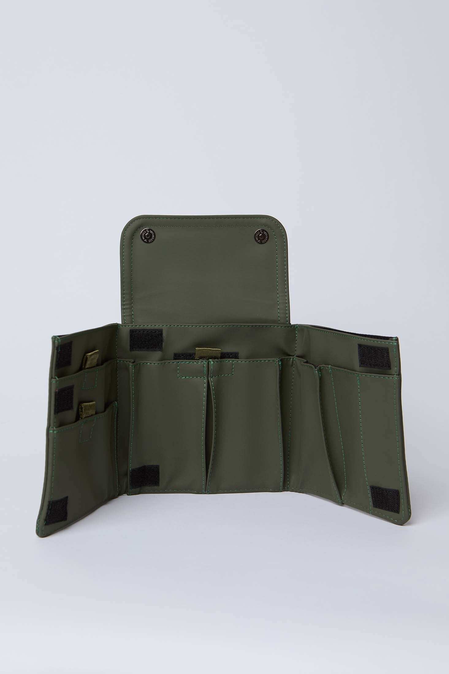 Olive green foldable organizer pouch with multiple compartments and snap closure