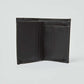 Open black leather wallet with card slots on white background
