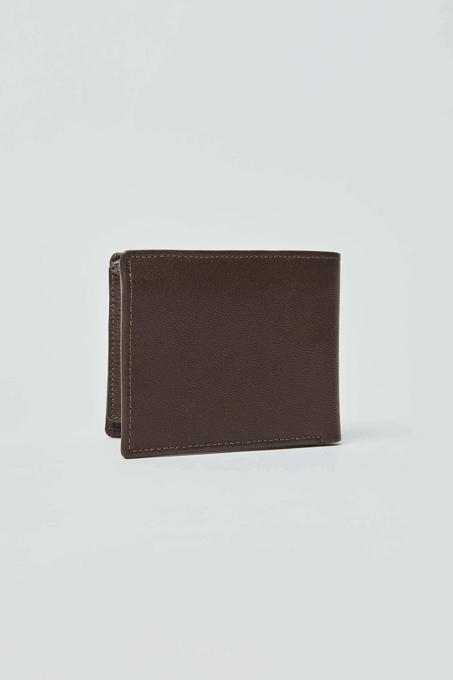 Men's dark brown leather bifold wallet on plain light background
