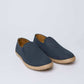 Men’s navy slip-on shoes with textured upper and woven sole on white background, Dalydress