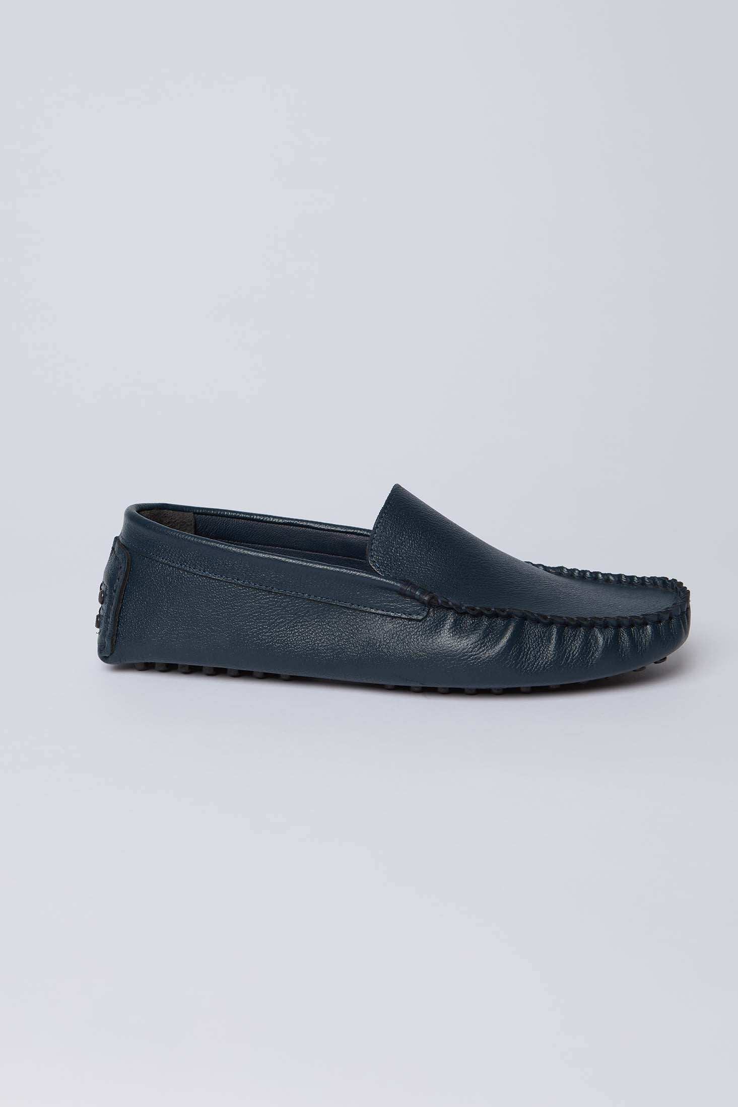 Dalydress men's navy blue leather loafer with moccasin stitching, side view on white background