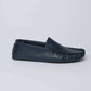 Dalydress men's navy blue leather loafer with moccasin stitching, side view on white background