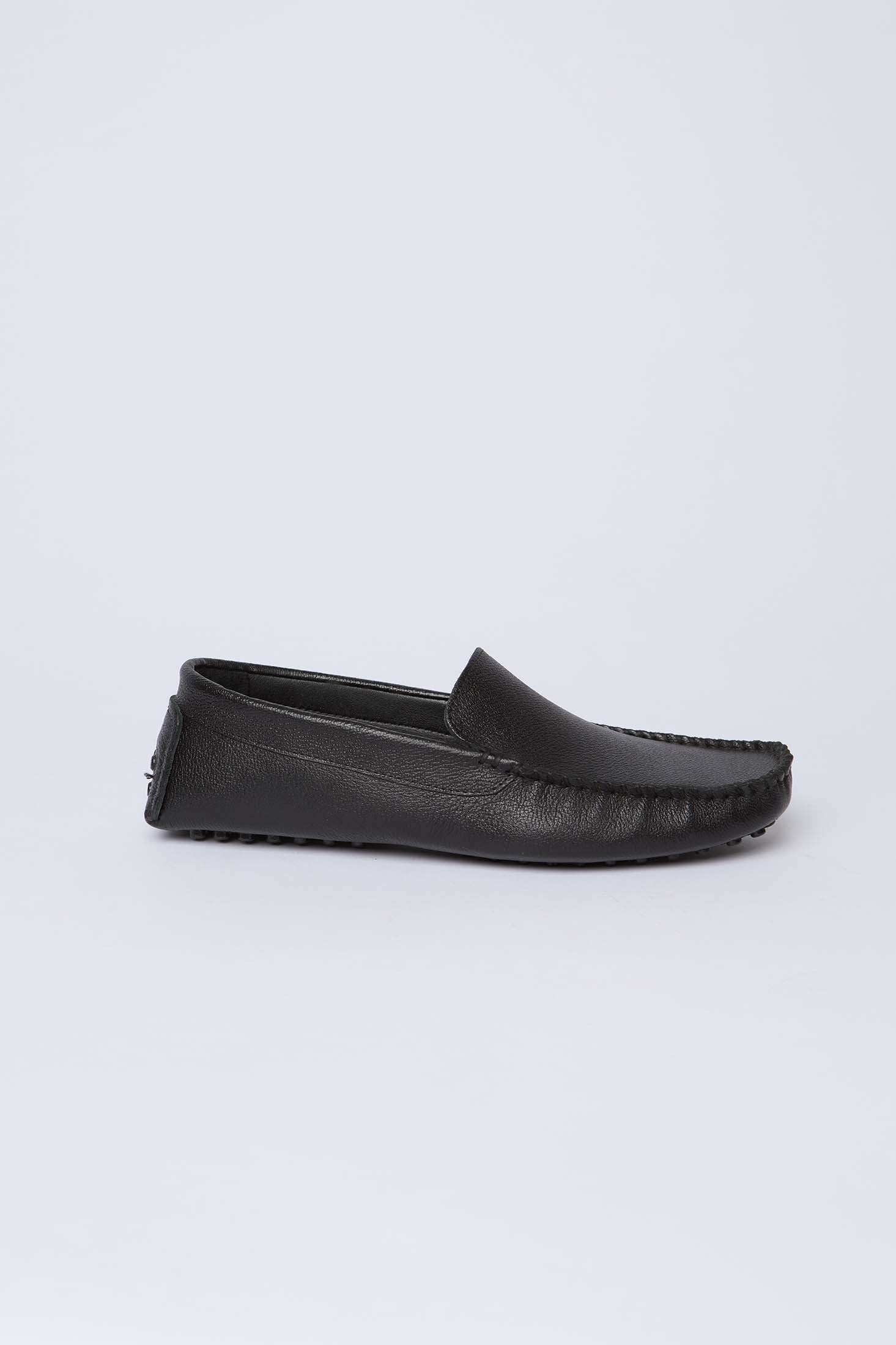 Dalydress men's black leather loafer with moccasin stitching, side view on white background