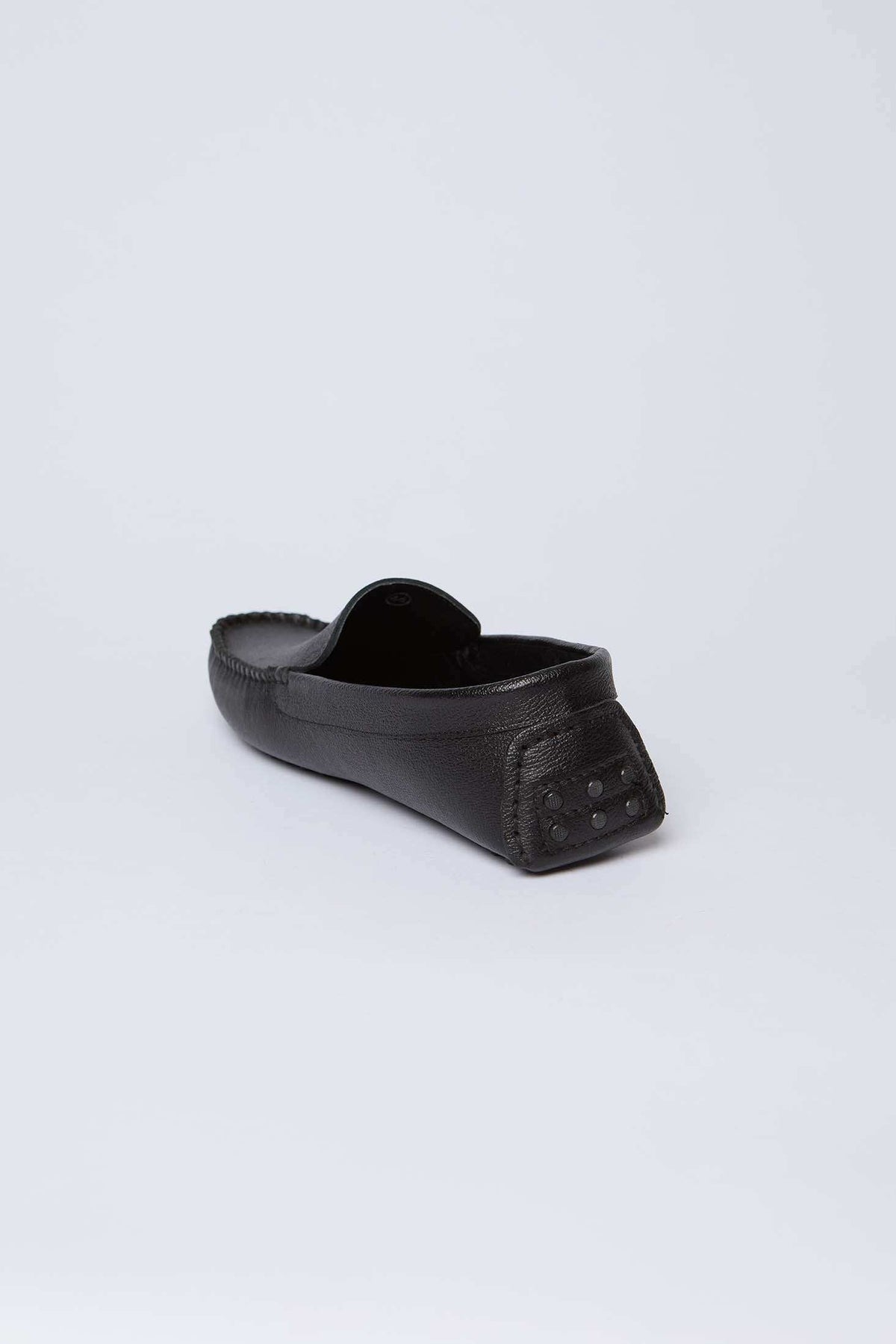 Dalydress men's black leather loafer with textured back, casual footwear on white background