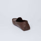 Men's brown leather loafer with rubber studded heel by Dalydress on white background