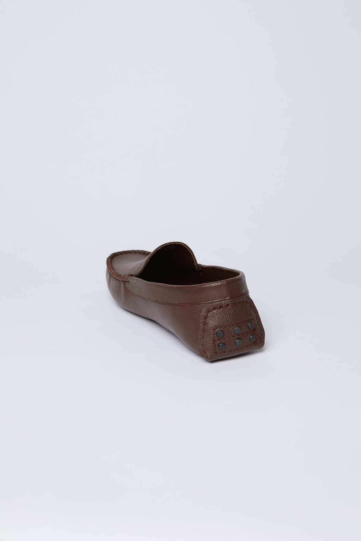 Men's brown leather loafer with rubber studded heel by Dalydress on white background