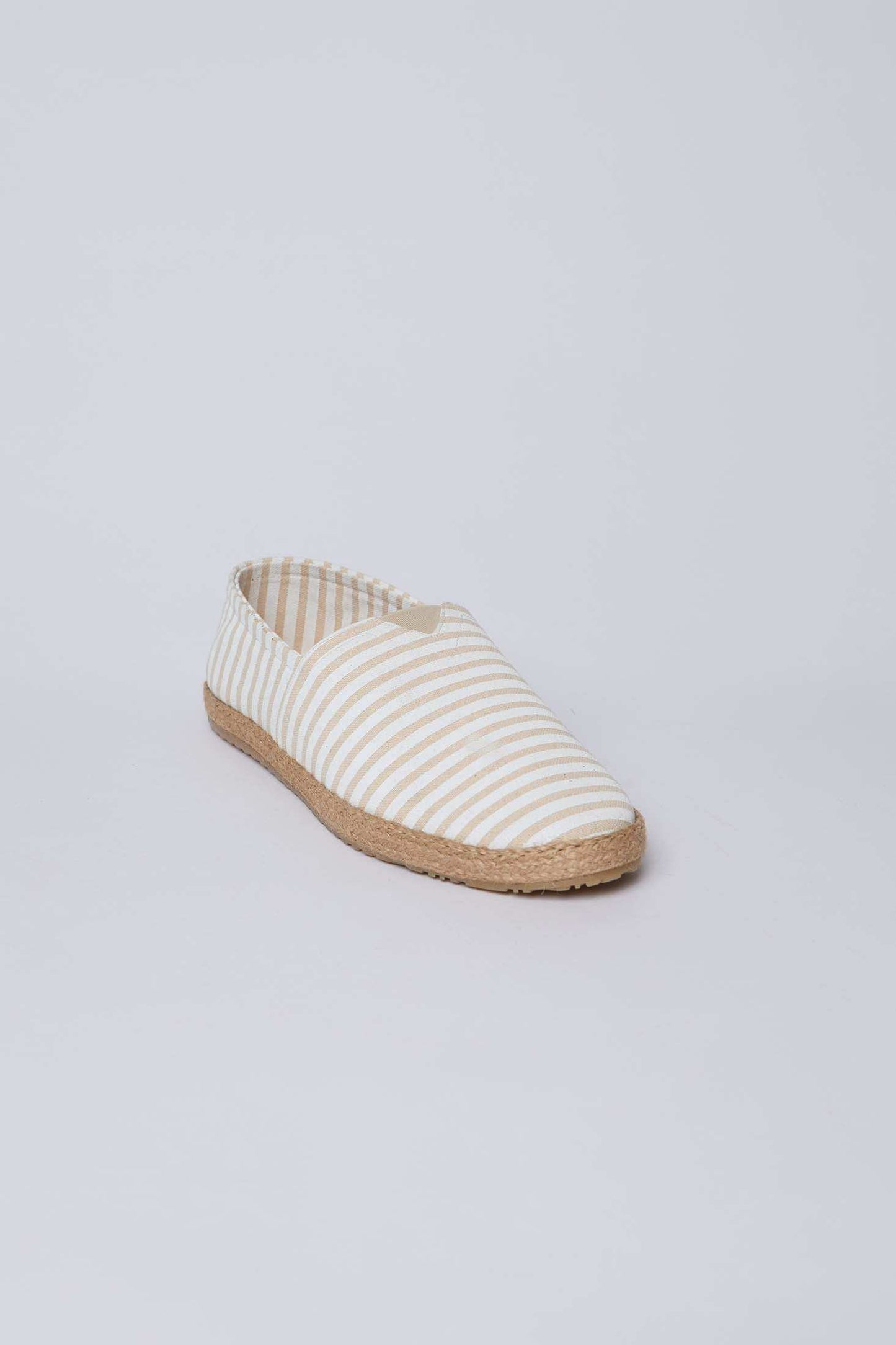 Beige and white striped espadrille flat shoe from Dalydress on white background
