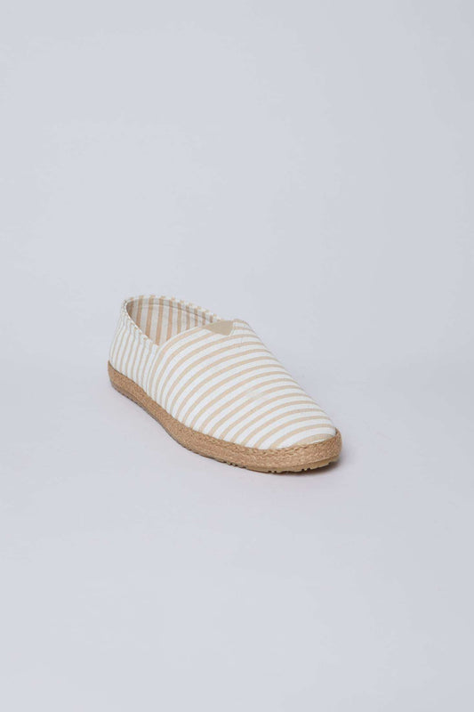 Beige and white striped espadrille flat shoe from Dalydress on white background