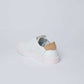 Dalydress men's white sneaker with tan suede heel detail on white background