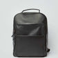 Dalydress black leather backpack with front zipper pocket on white background