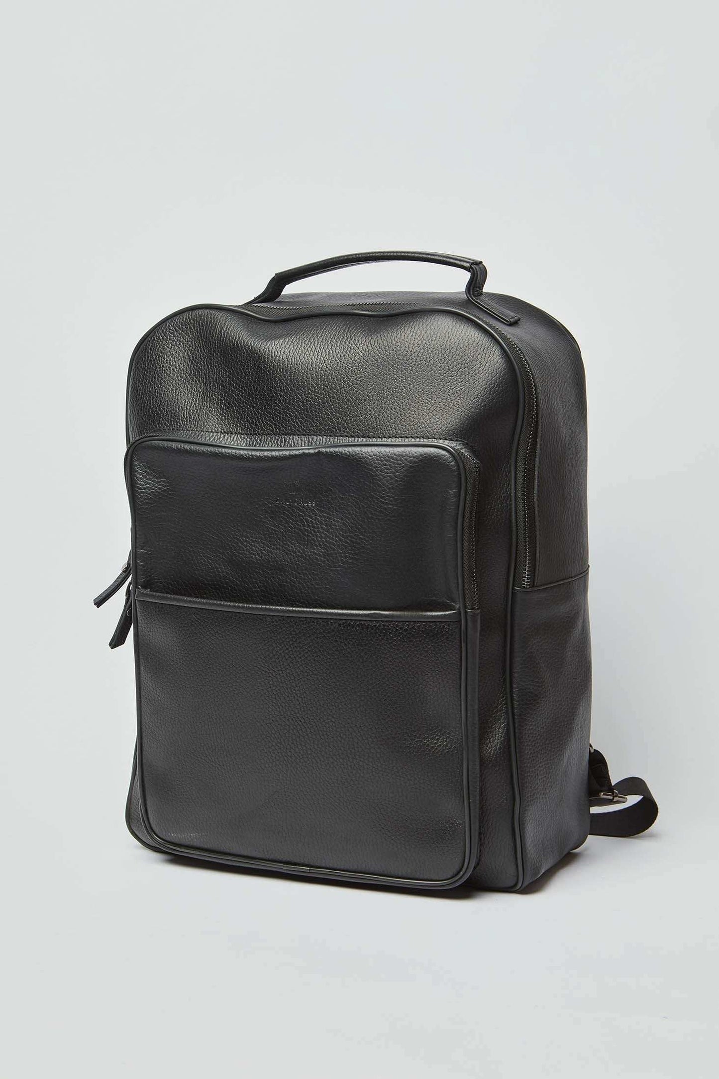 Dalydress men's black leather backpack with front pocket on white background
