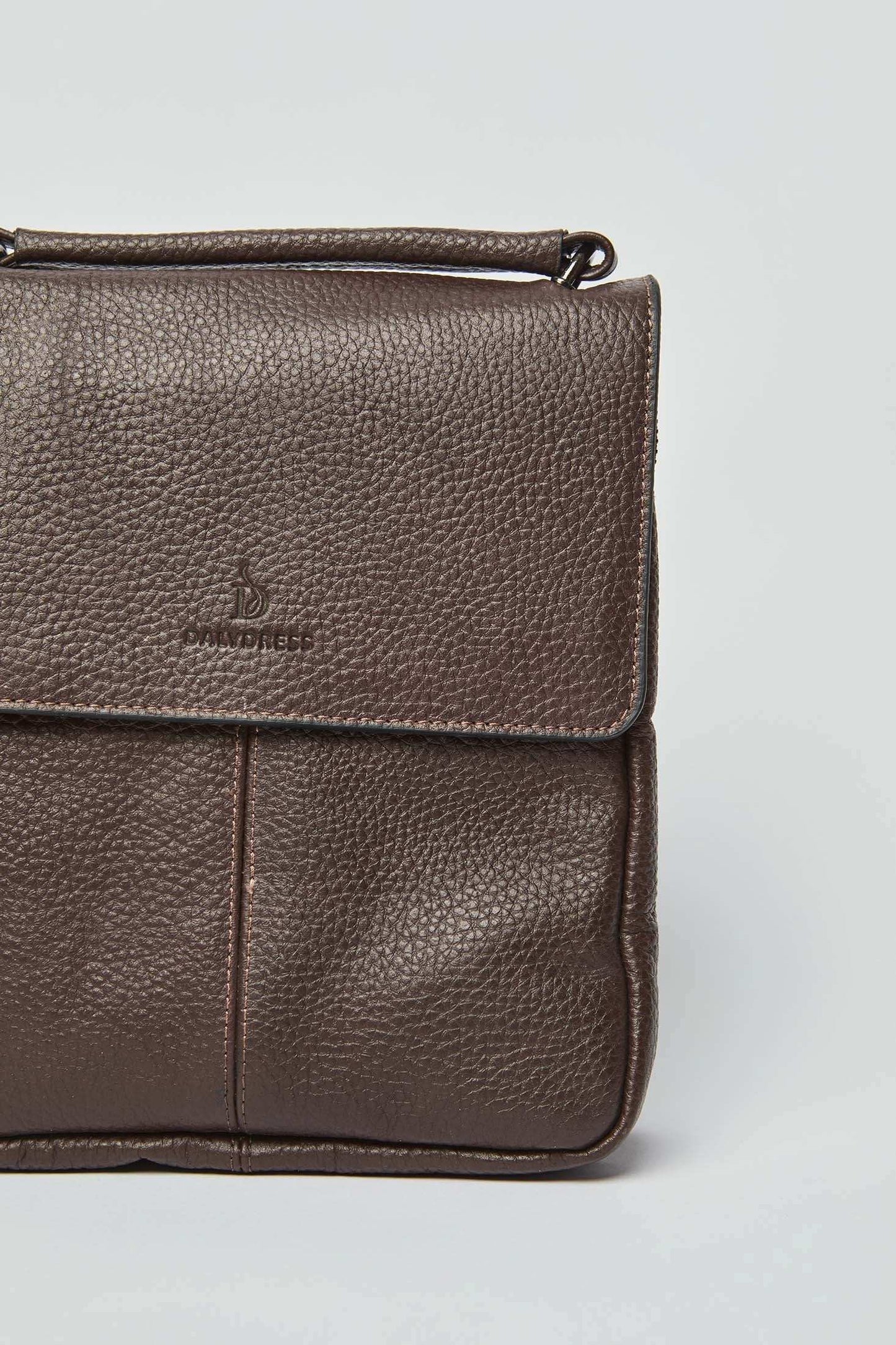 Dalydress brown leather men's bag with textured finish and top handle