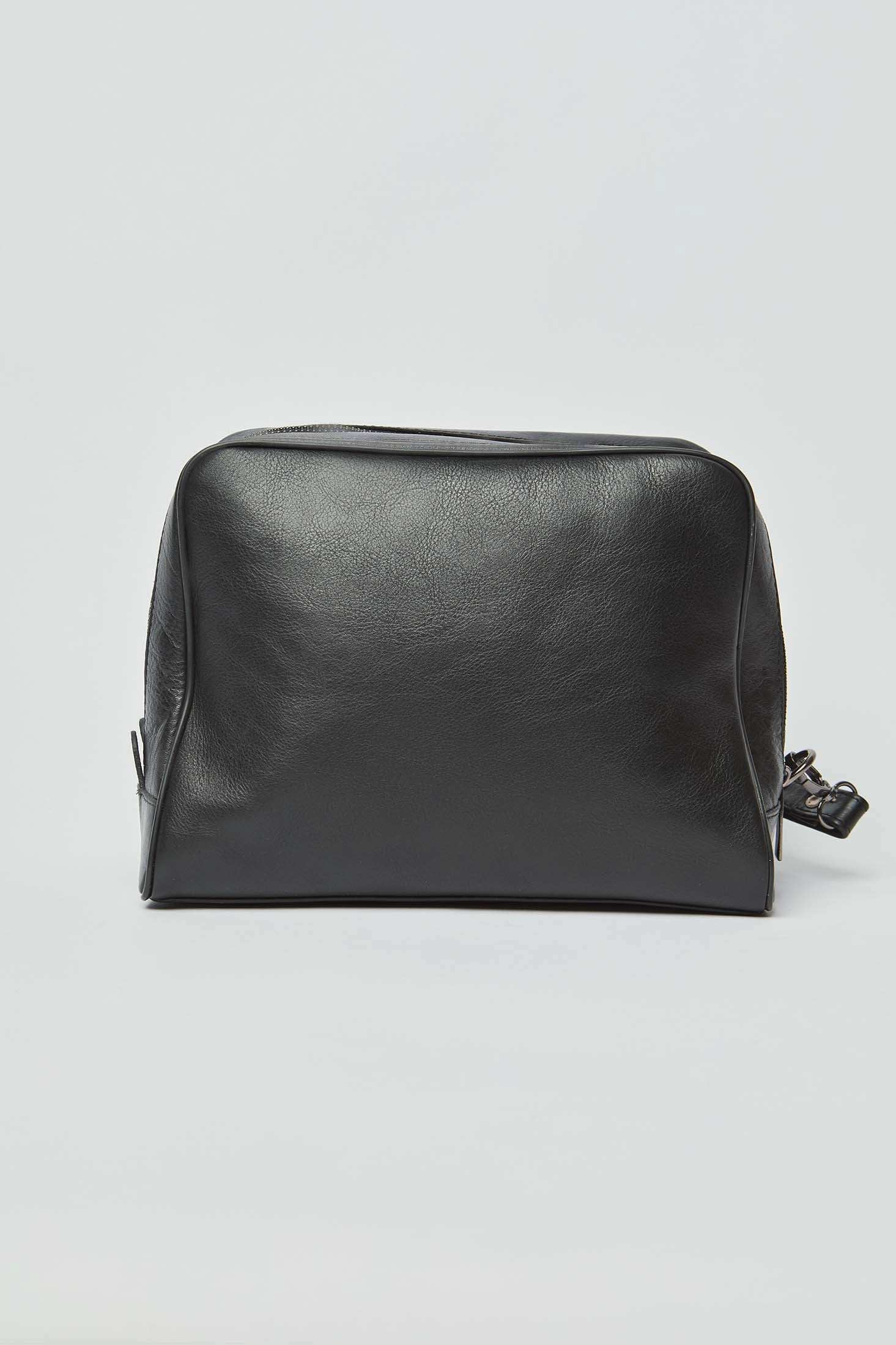 Dalydress black leather toiletry bag on white background, men's accessories