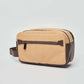 Dalydress tan and brown men's toiletry bag with front zipper pocket on white background