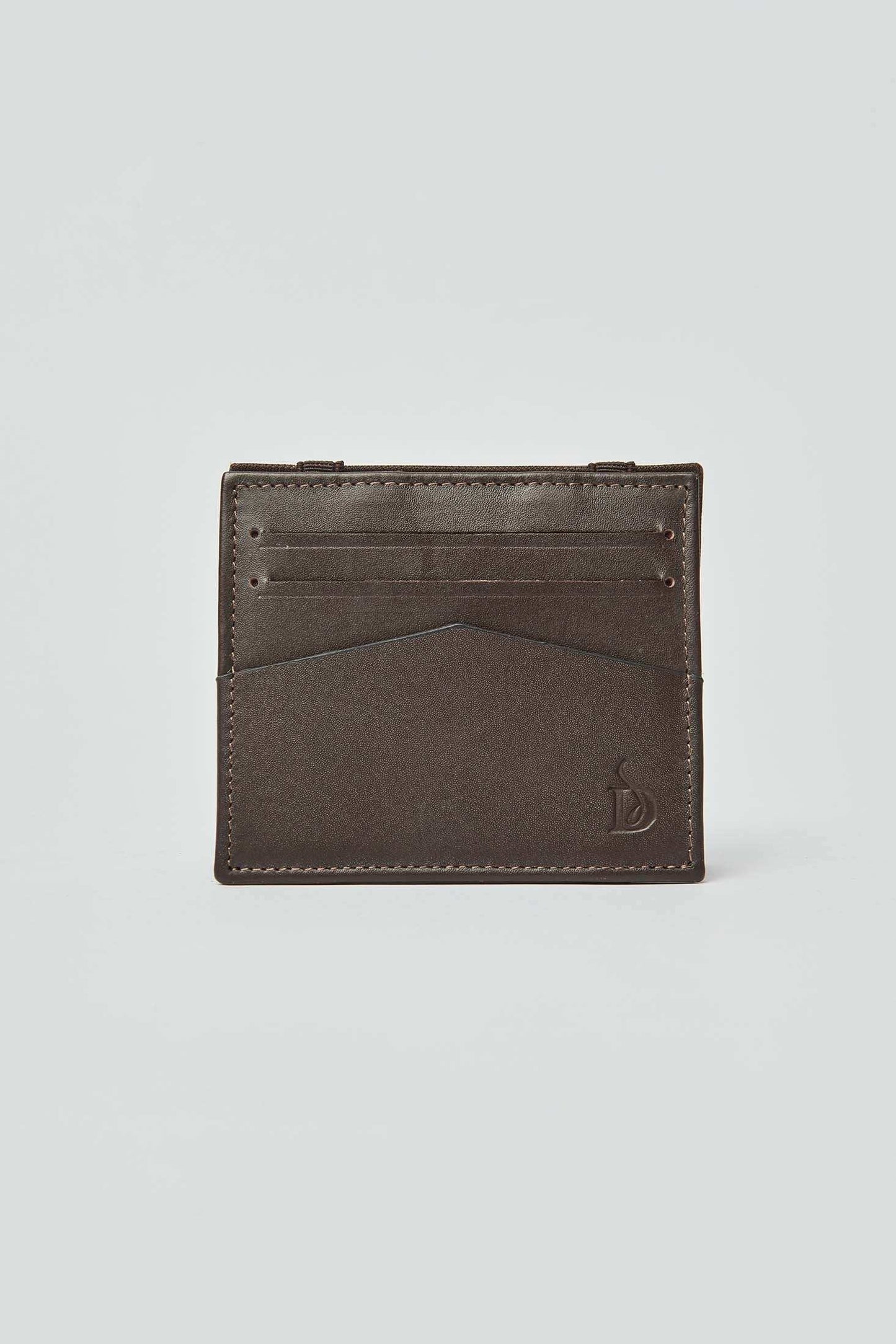 Dalydress brown leather card holder with logo, minimalist men's accessory on light background