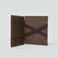 Brown Dalydress men's wallet with elastic bands, open and standing on a light background