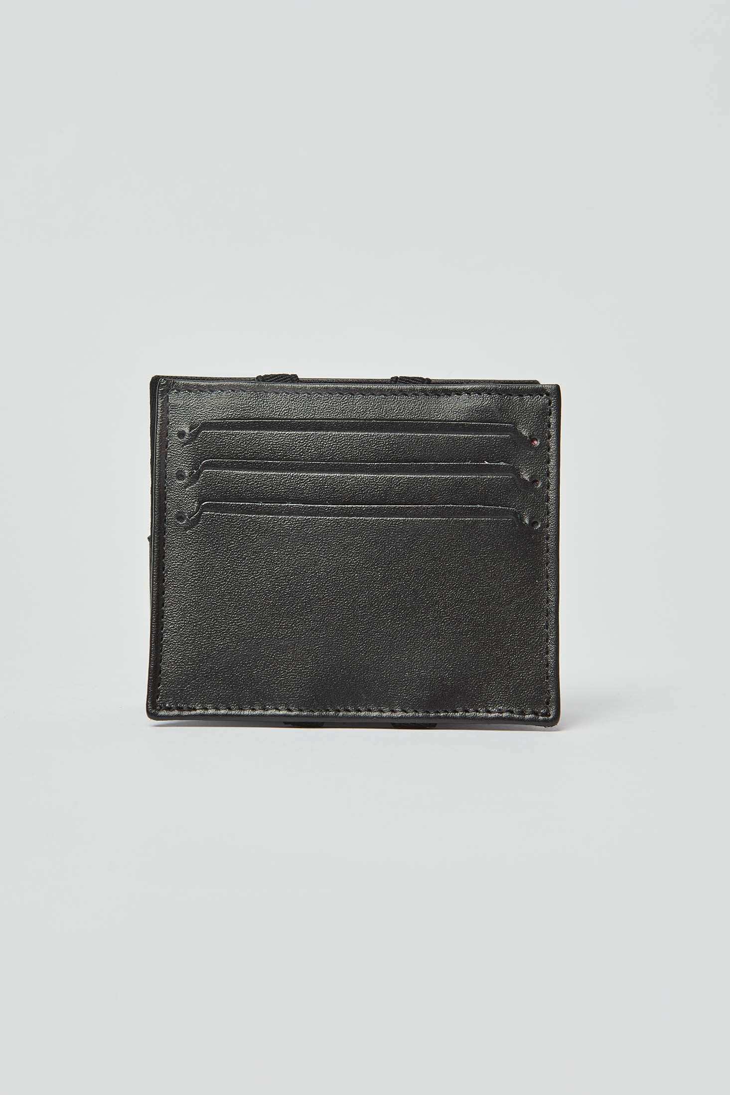 Dalydress black leather card holder with three slots, minimal design on white background