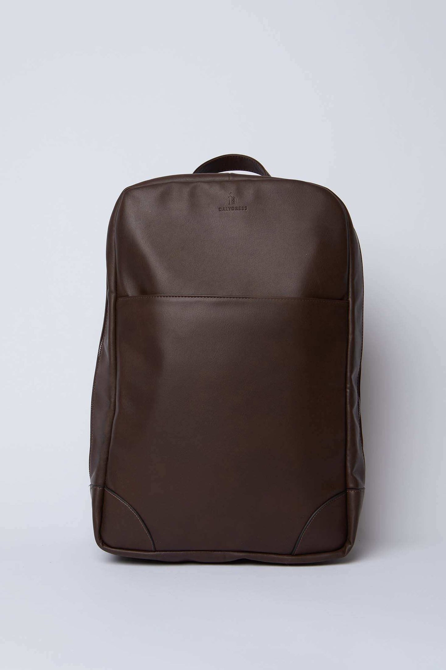 Dalydress brown leather backpack with minimalist design on plain background