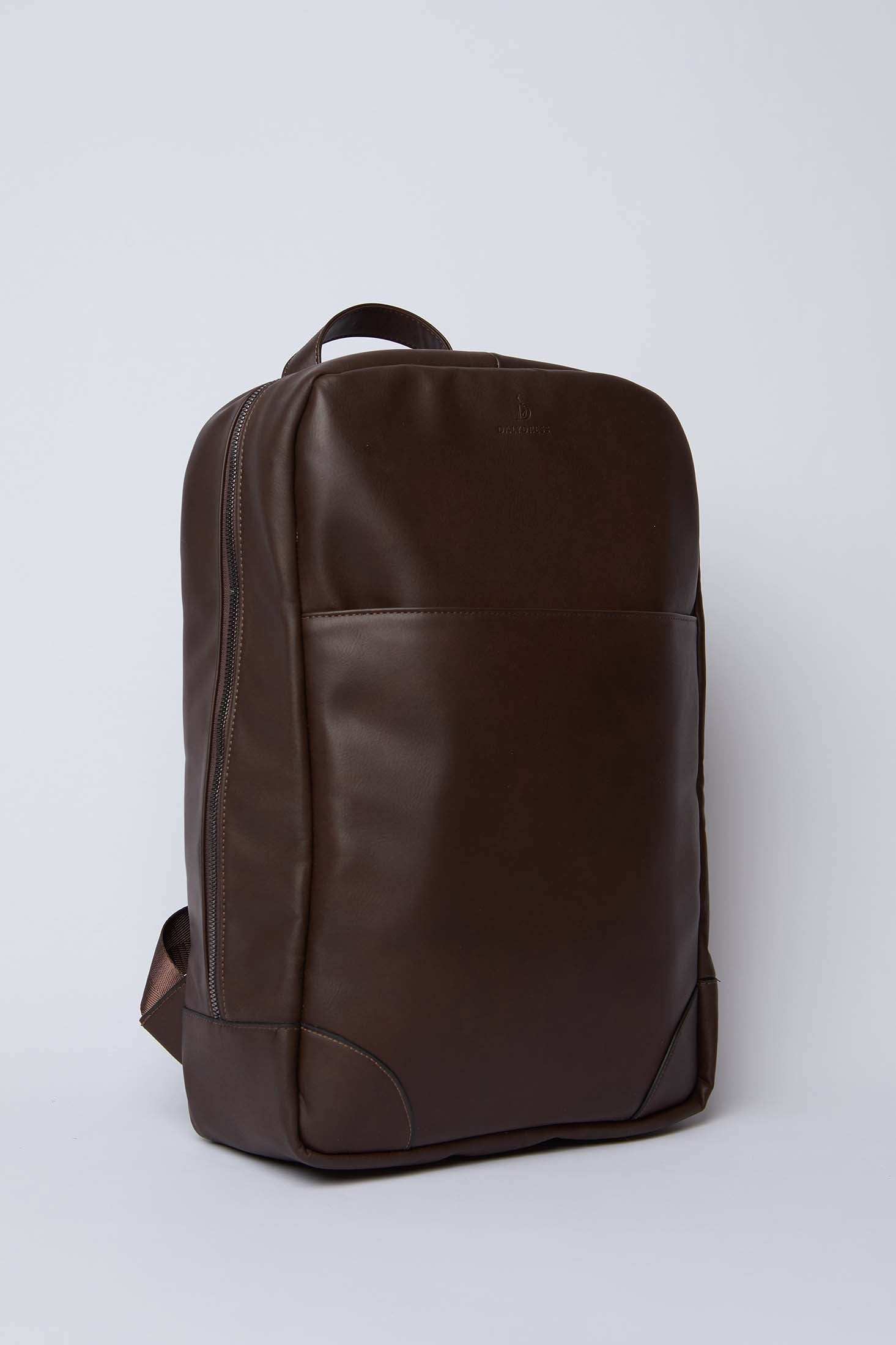 Dalydress brown leather backpack with front pocket, minimalist design on white background