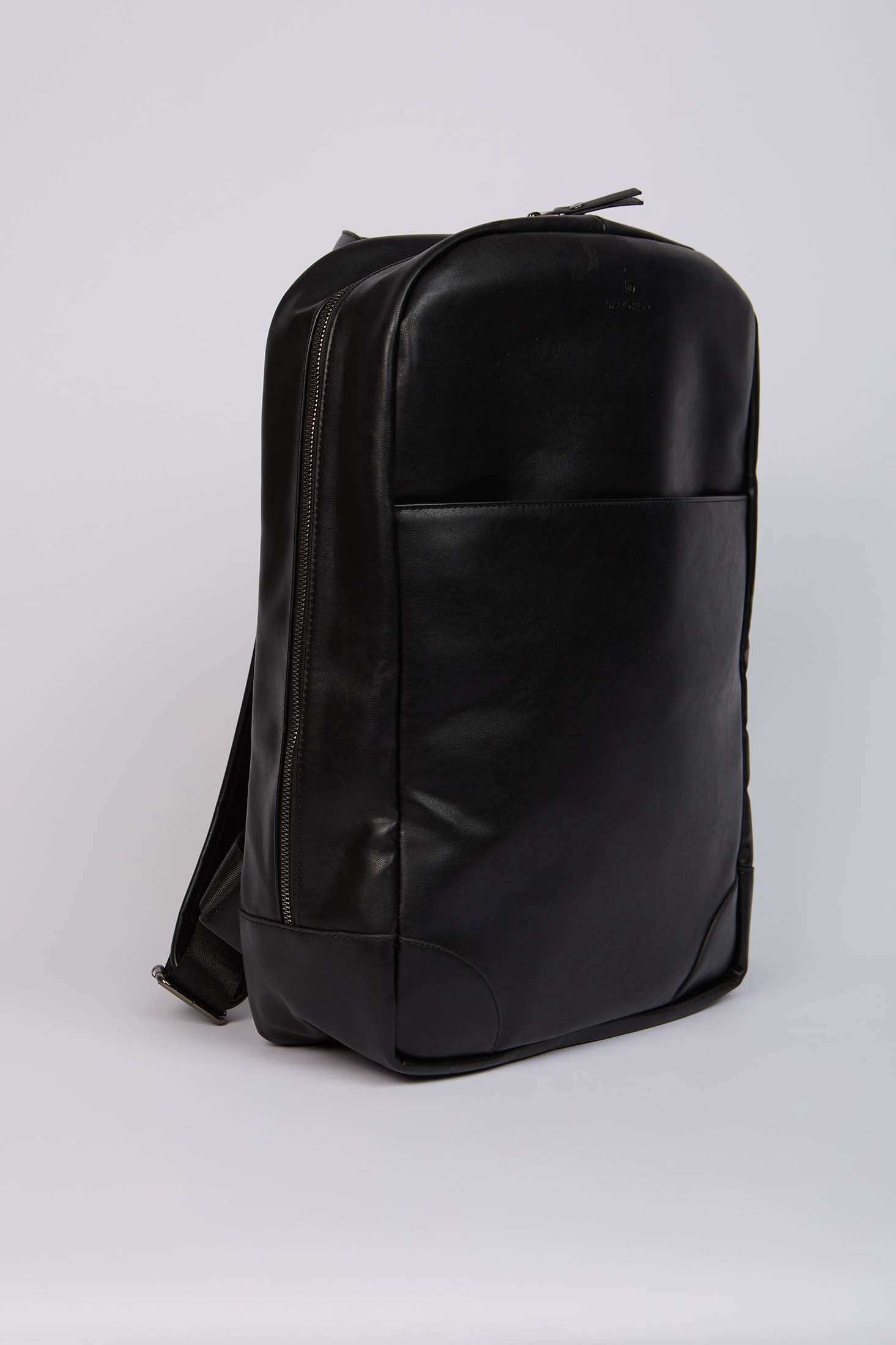 Dalydress black leather backpack with front pocket on white background