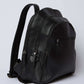 Dalydress black leather backpack with multiple zippered compartments, minimalist design