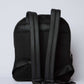 Dalydress black backpack with padded straps and mesh back, minimalist unisex design