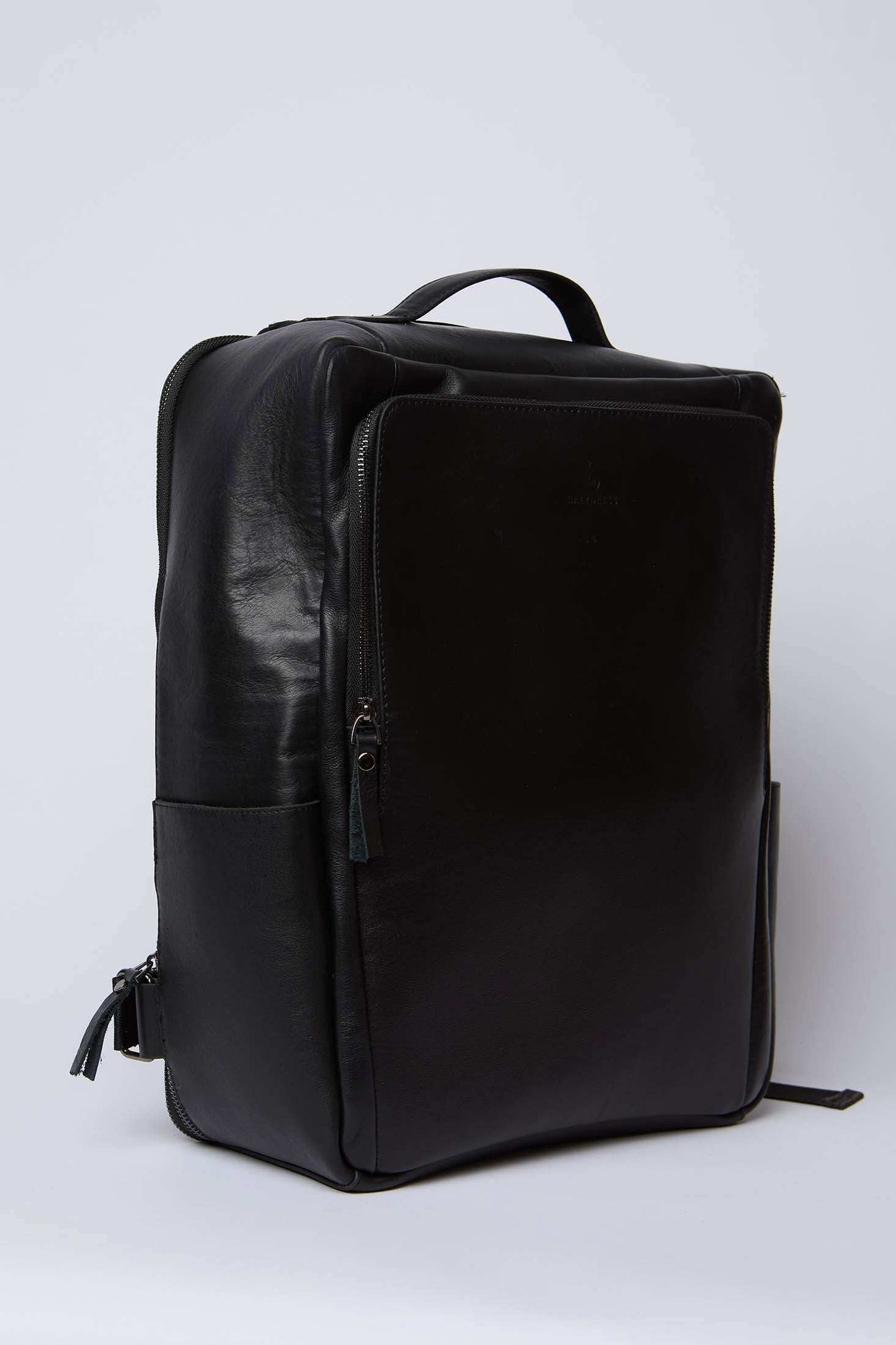 Dalydress black leather backpack with front zipper pocket and handle, minimalist design