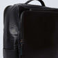 Dalydress black leather urban backpack with front zip pocket, minimalist design