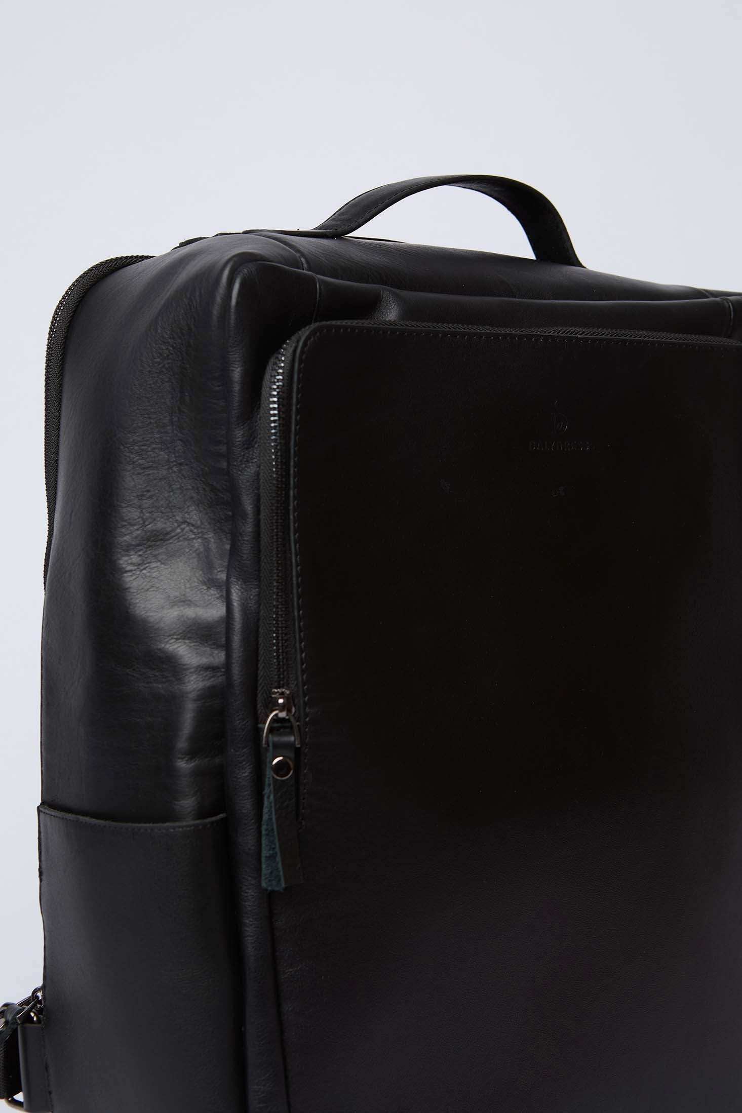 Dalydress black leather urban backpack with front zip pocket, minimalist design
