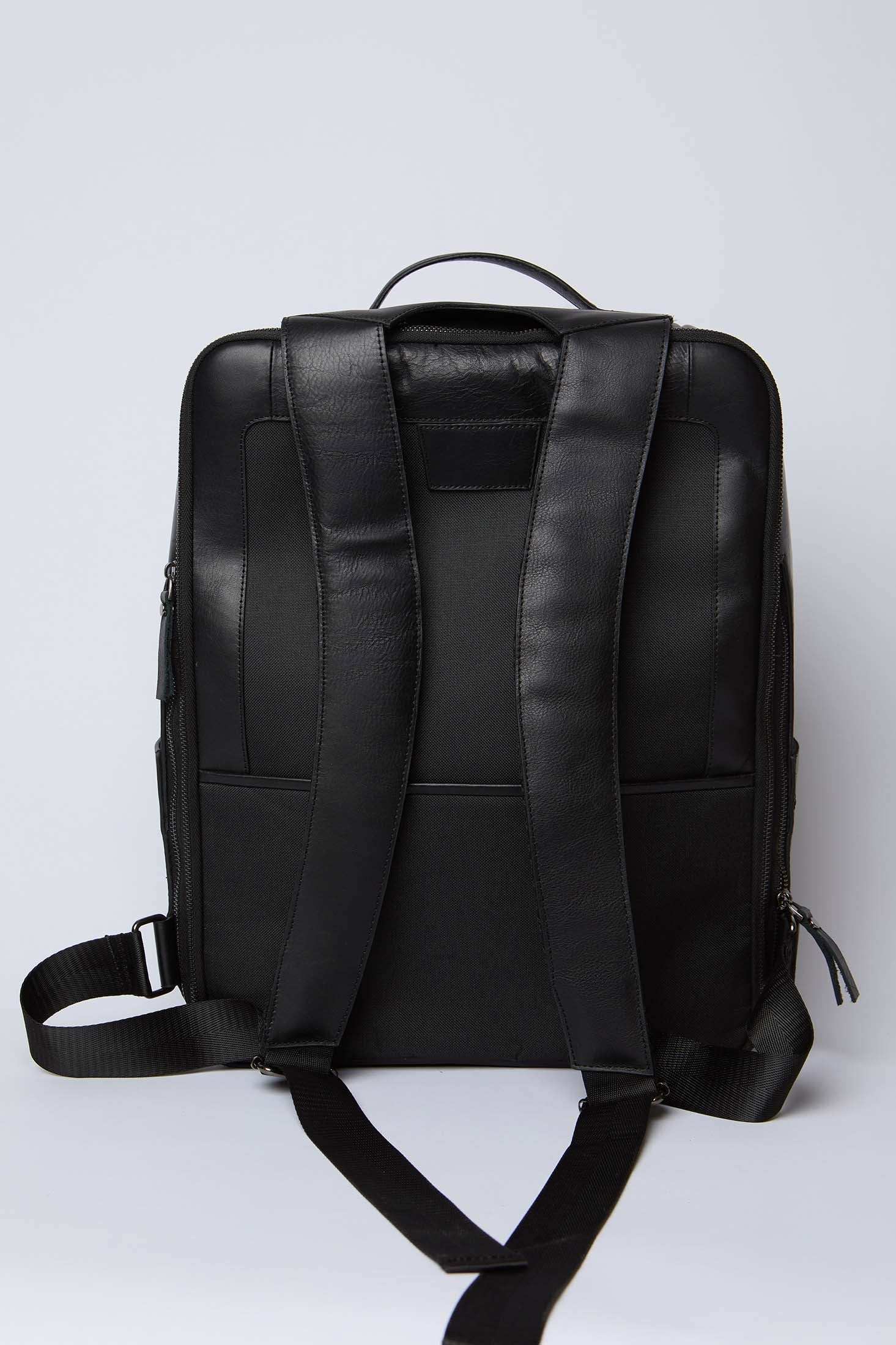 Dalydress black leather backpack with padded straps, modern urban men's accessory