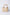 Beige textured handbag with ruched handle and gold hardware on white background