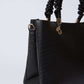 Black faux crocodile leather handbag with ruched top handles and gold hardware