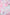 Abstract pink and white fabric with geometric building and window print pattern.