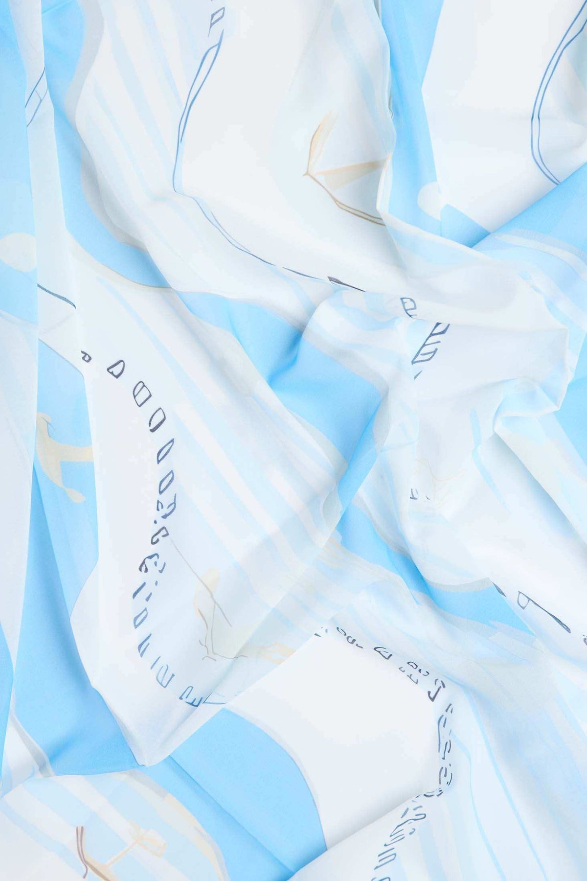 Light blue and white patterned fabric with abstract line and text design, soft texture