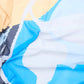 Abstract pastel and blue patterned fabric with soft folds and brushstroke design
