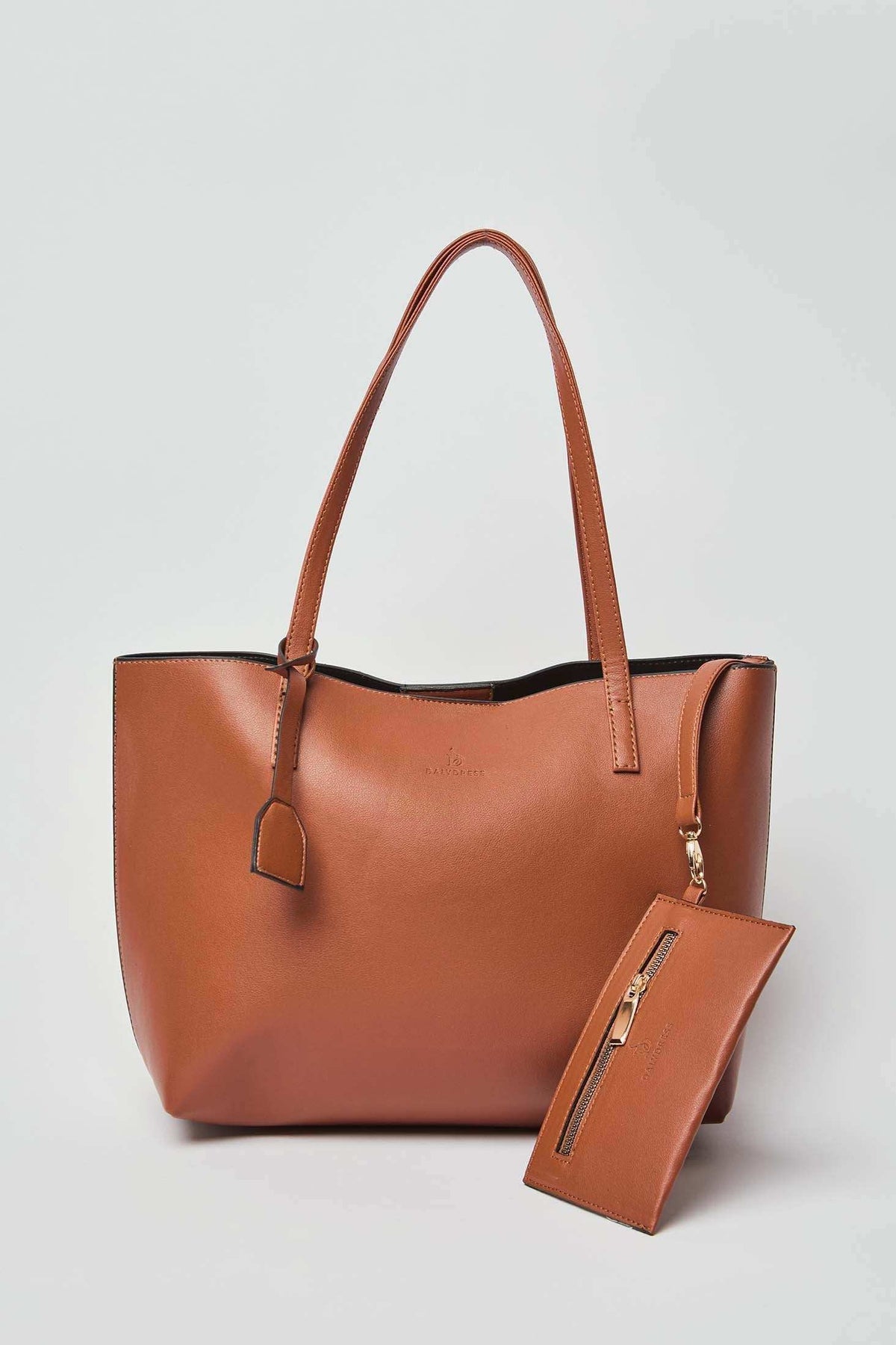 Dalydress brown leather tote bag with detachable zip pouch, minimalist design, on white background