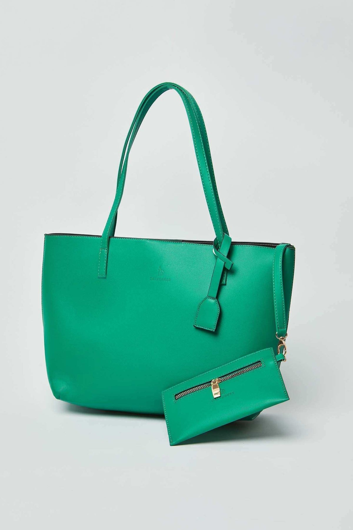 Dalydress green tote bag with matching zip pouch, women's accessory on plain background