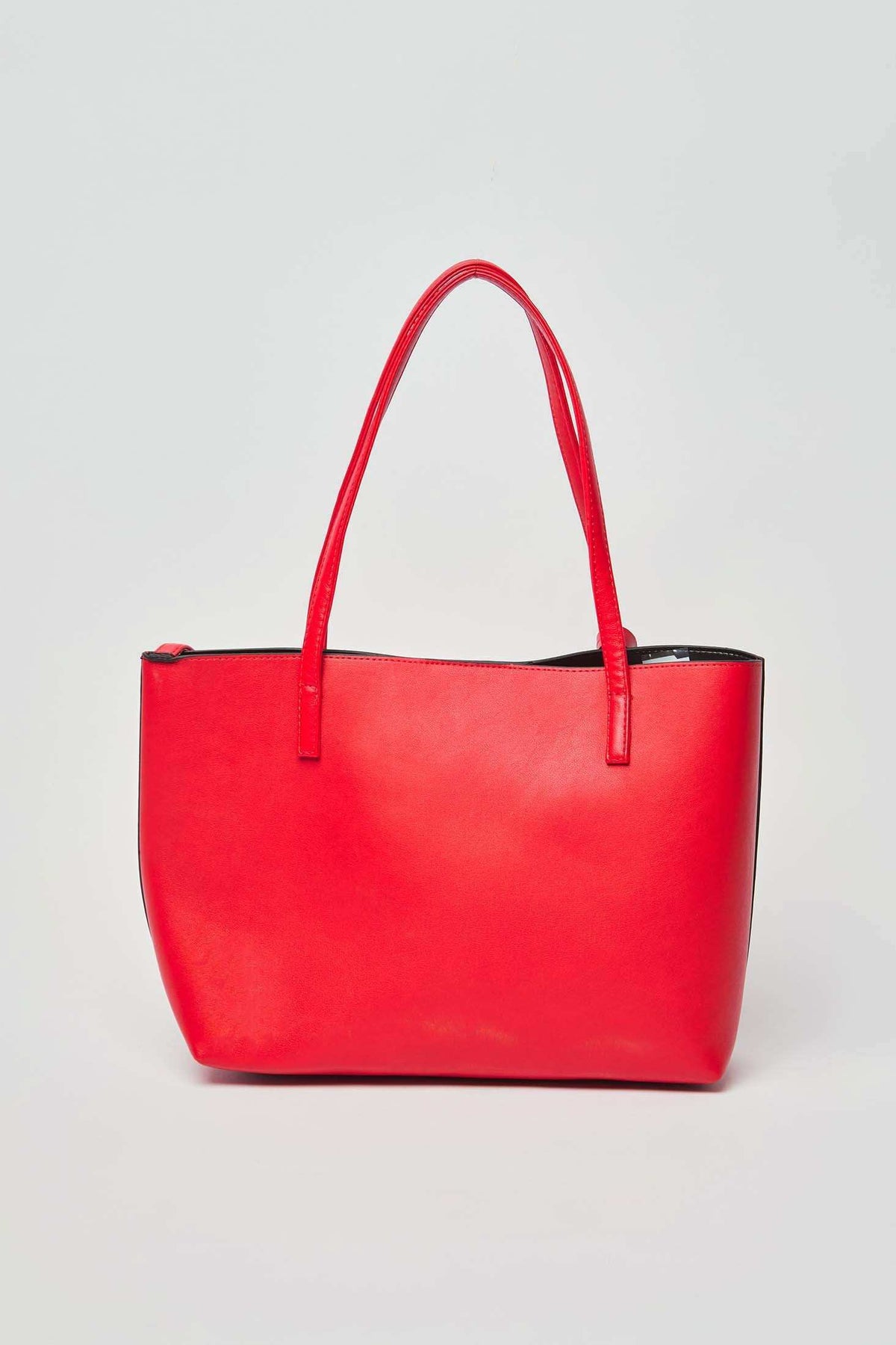 Dalydress women's red tote bag with dual handles on plain background