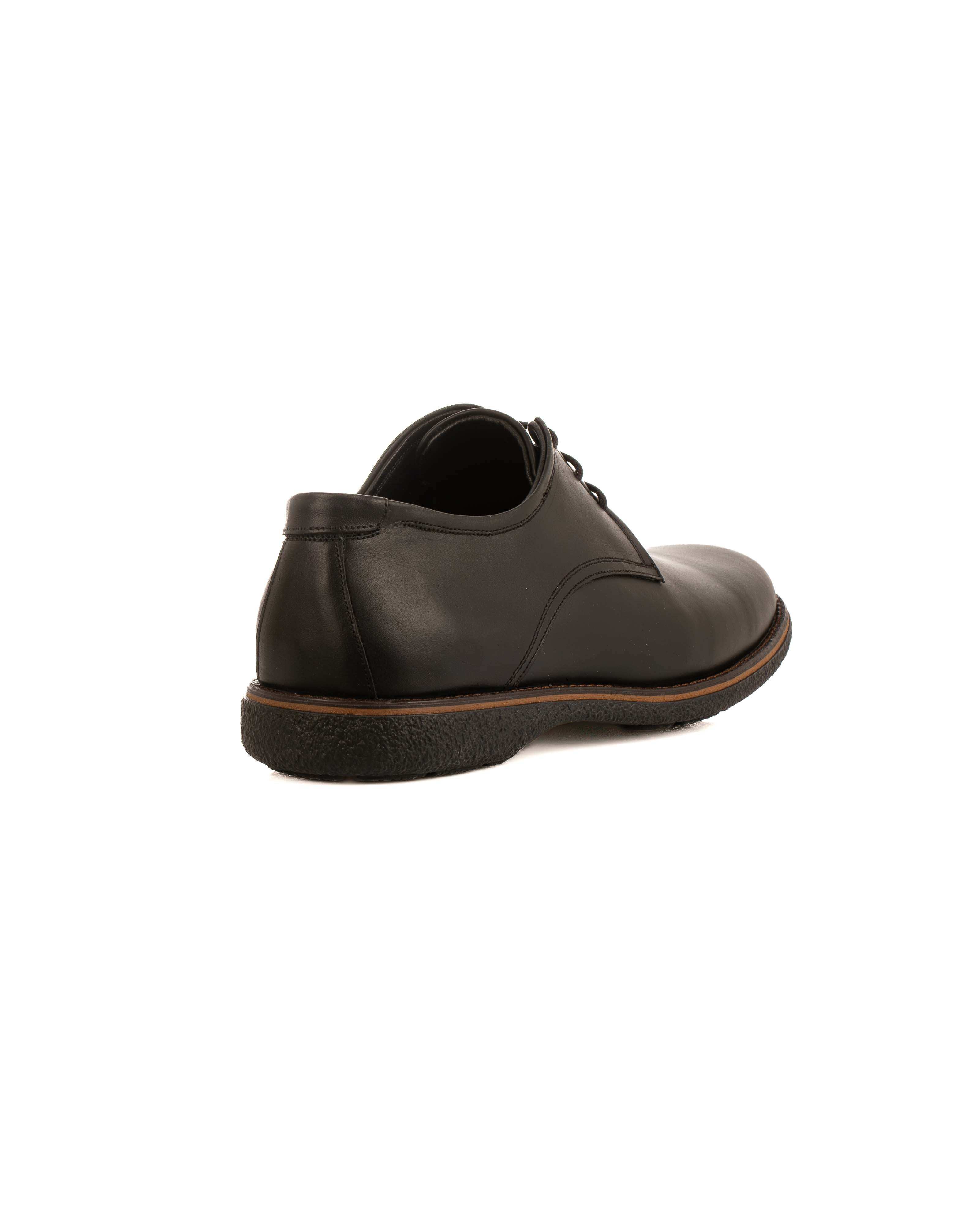 أحذية كلاسيكية فاخرة من الجلد المزود بالرباط