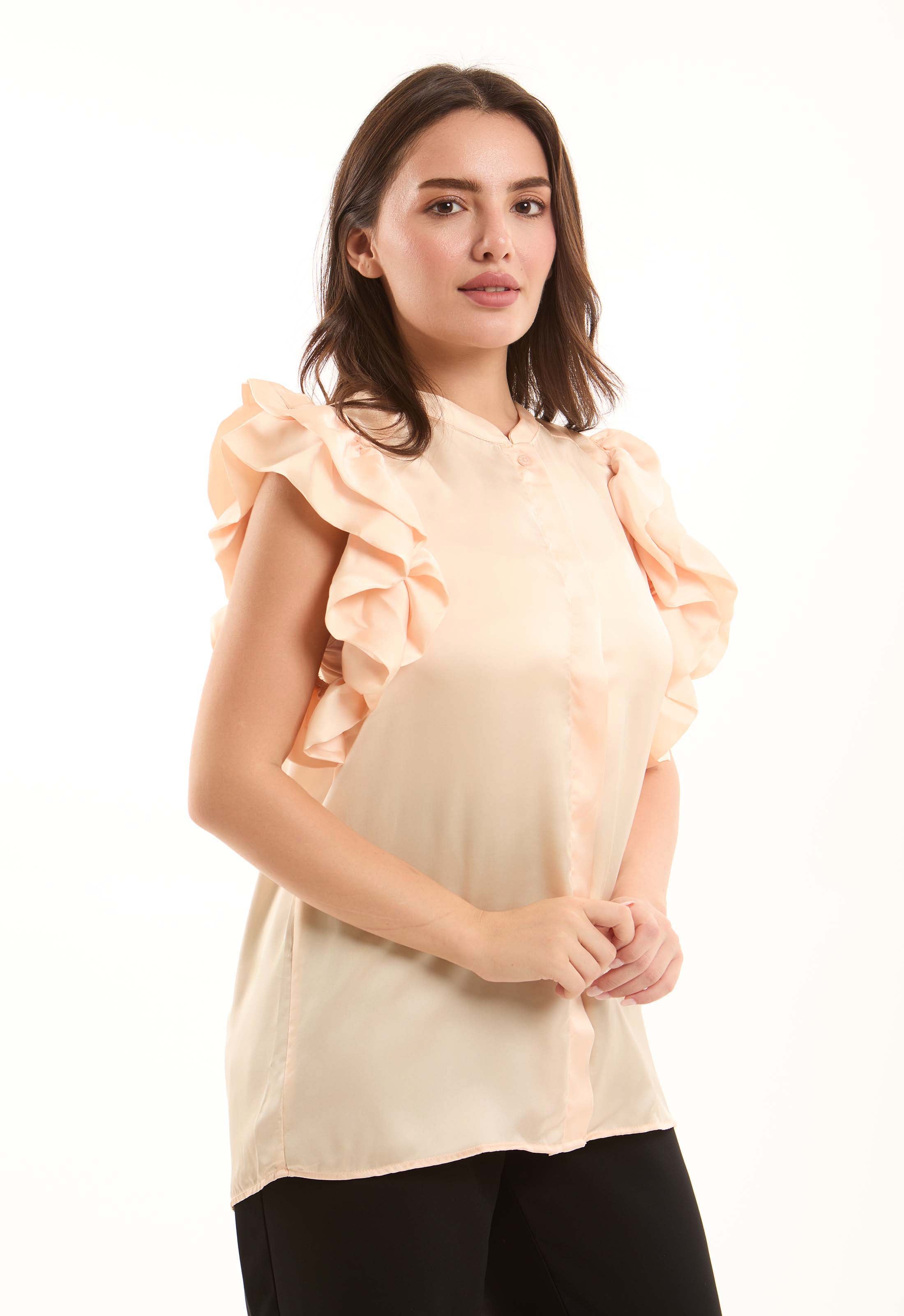 بلوزة أنيقة بكسرات بدون أكمام