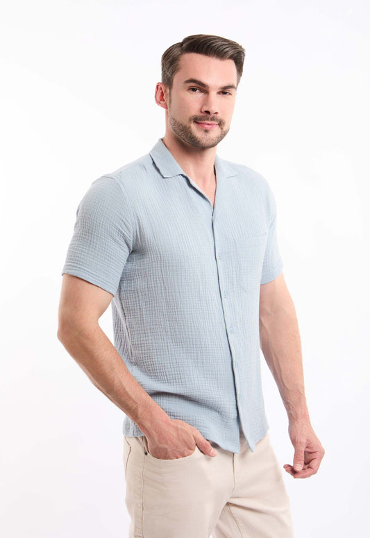 قميص بنقشة مزخرفة بأكمام قصيرة وجيب أمامي