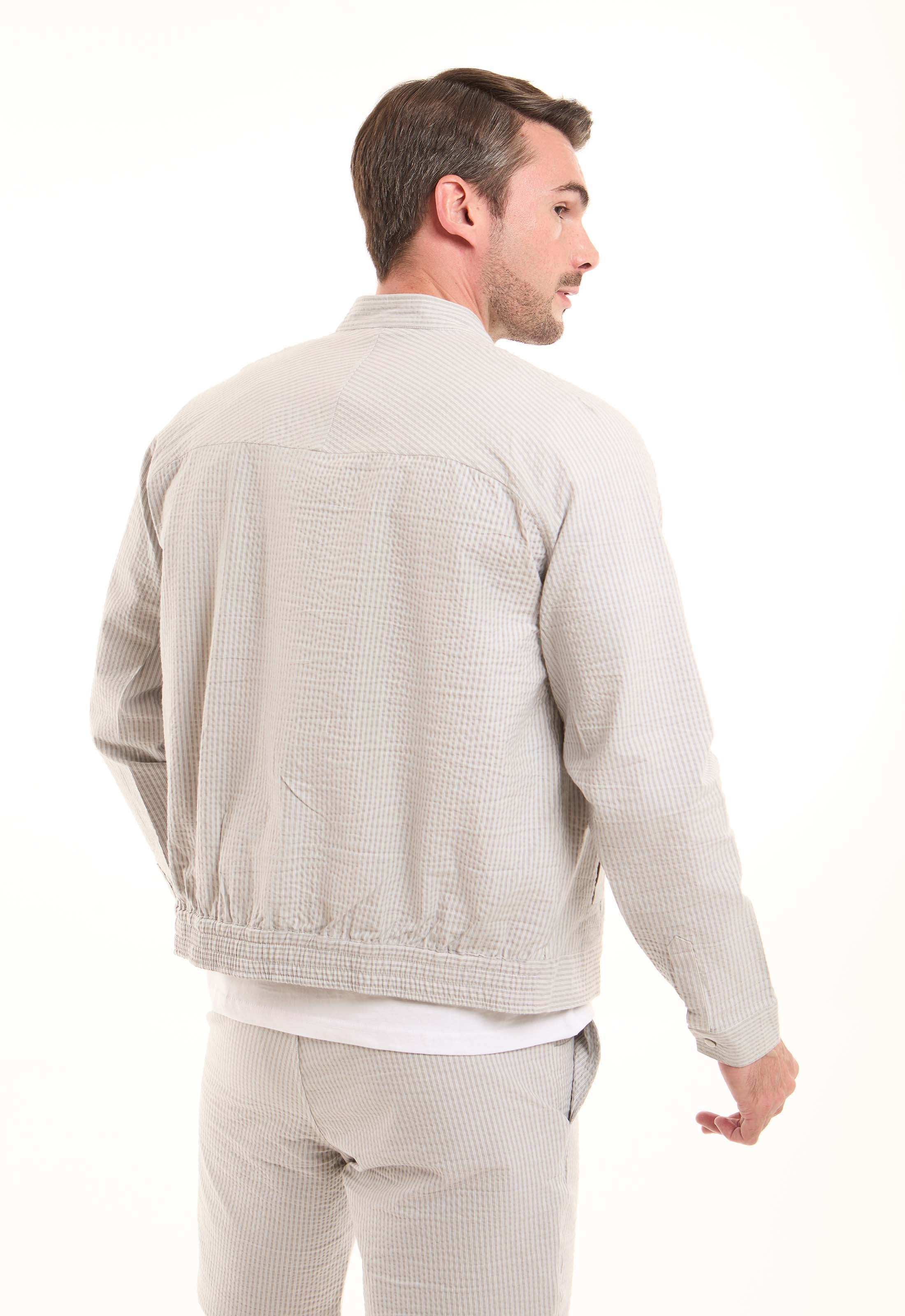 جاكت كاجوال بملمس بارز بزرار كبس أمامي