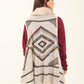 Sleeveless Patterned Poncho with Fur Neckline