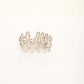 Elegant Sculpted Metal Bangle with Linked Pattern