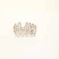 Elegant Sculpted Metal Bangle with Linked Pattern