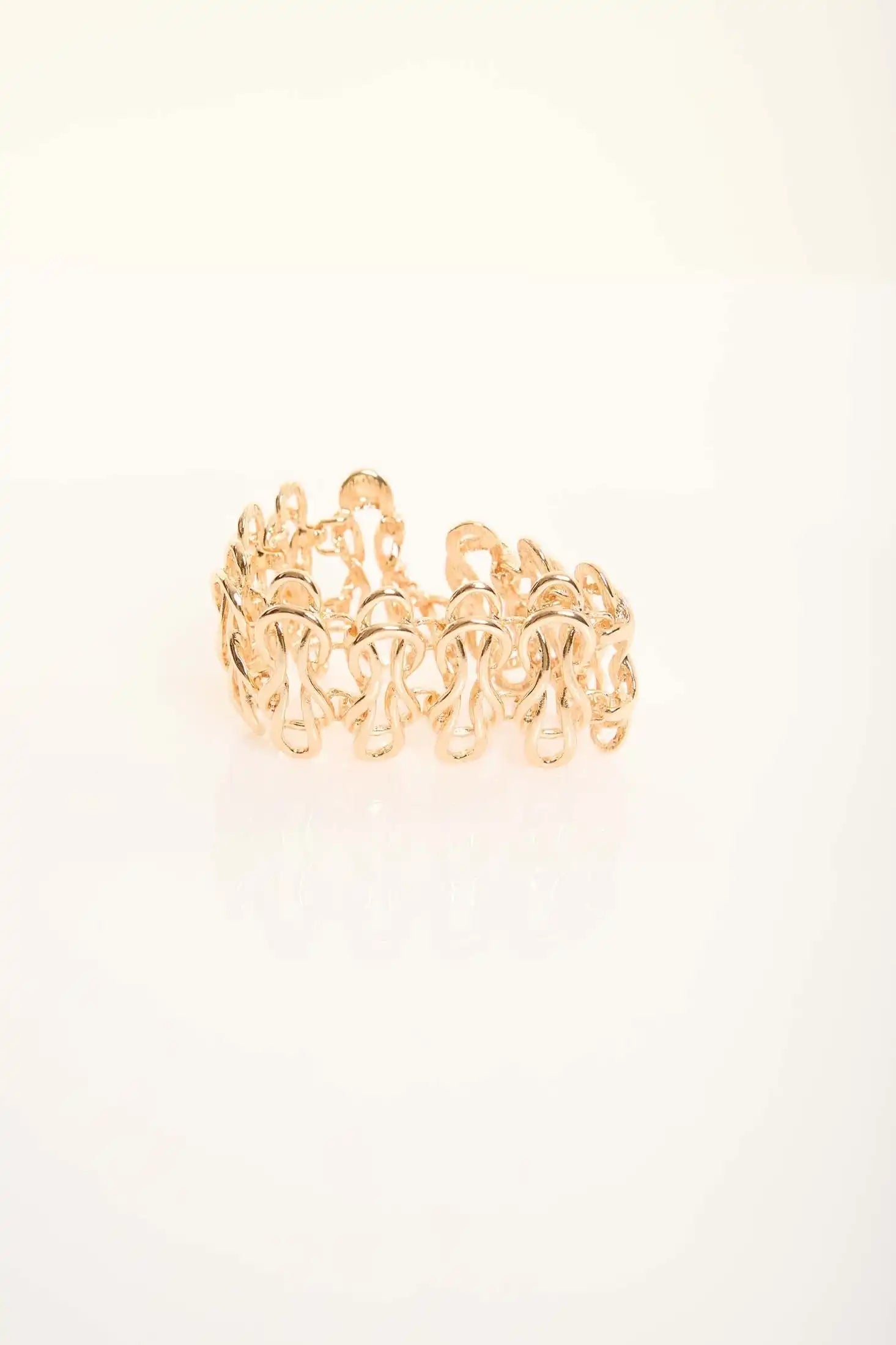 Elegant Sculpted Metal Bangle with Linked Pattern