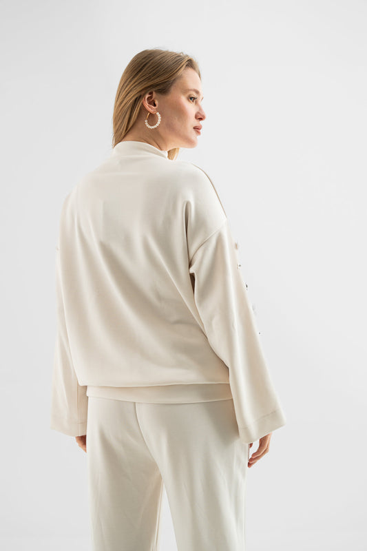 توب كريمي بقصة مريحة أنيقة