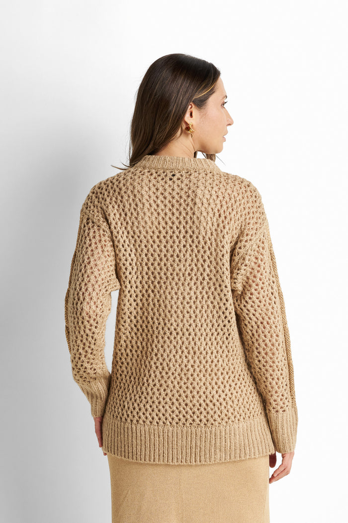 Cable and open-stitch knit sweater