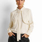 Embroidered yoke tie-neck blouse