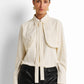 Embroidered yoke tie-neck blouse